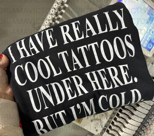 I have really cool tattoos under here. but I’m cold. Graphic shirt