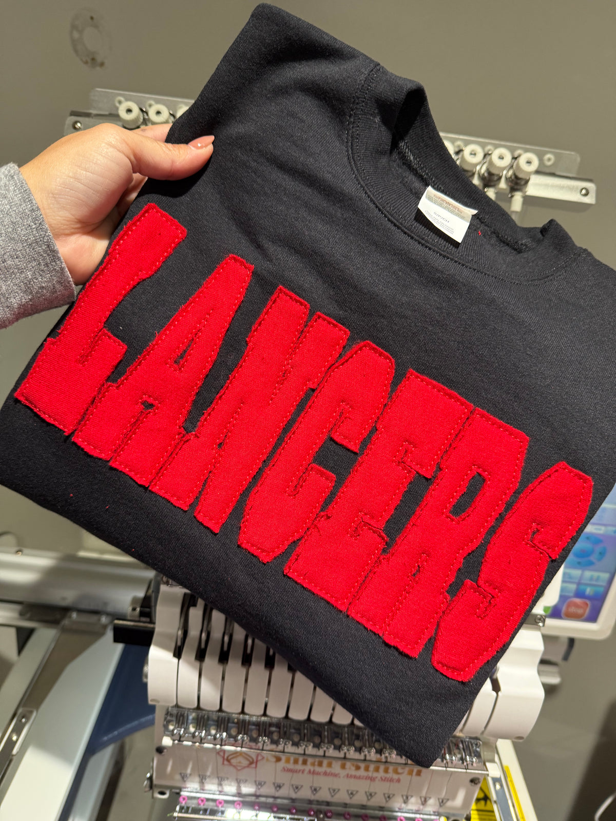 Lancers sweater embroidered applique shirt