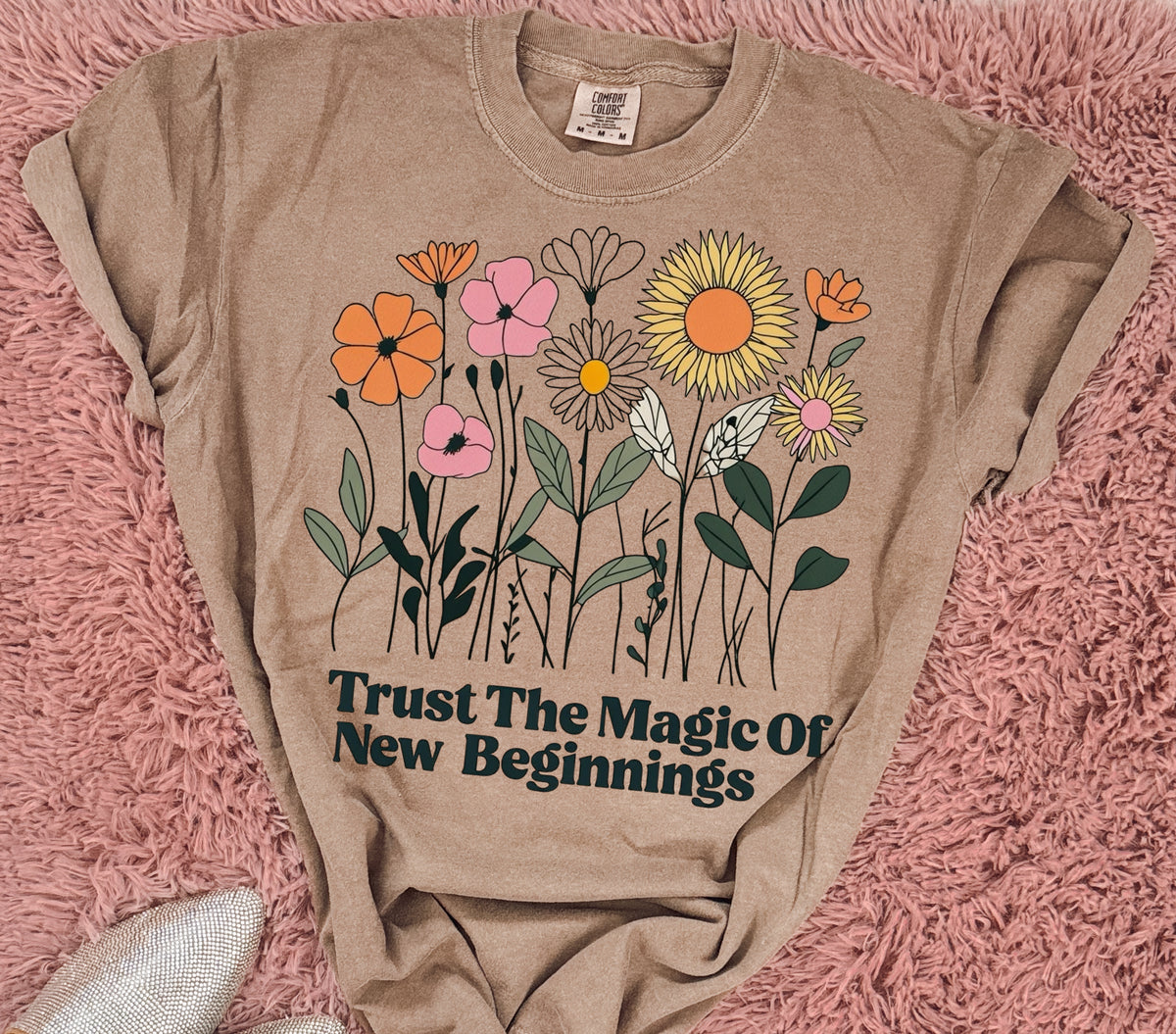 Trust the magic of new beginnings. Graphic shirt