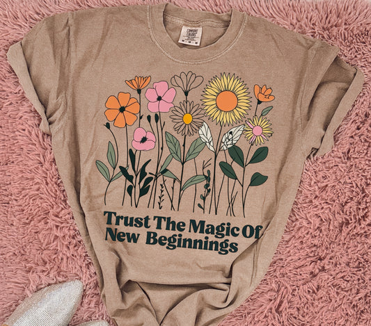 Trust the magic of new beginnings. Graphic shirt