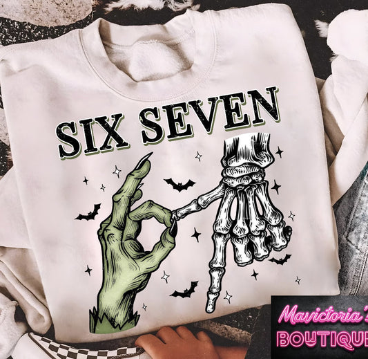 KIDS 6 7 skellie hands Halloween graphic shirt